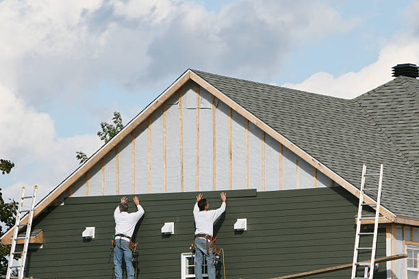 Professional Siding Installation technician working in Roanoke, VA